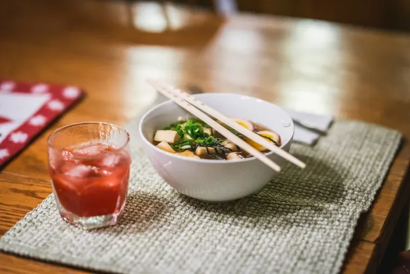 red liquid in white ceramic bowl